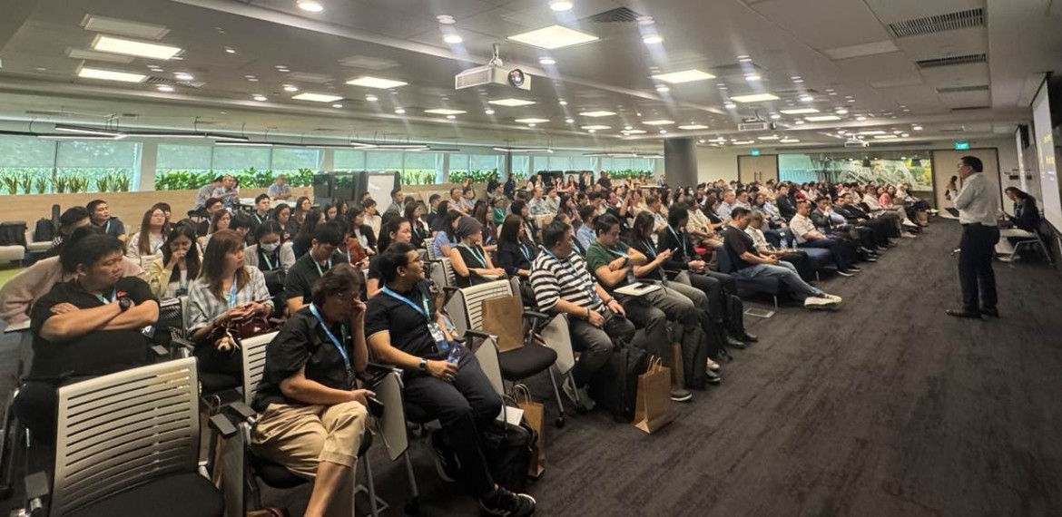 A full-house crowd of over 180 construction professionals listening to a keynote speaker, reflecting the industry&rsquo;s strong interest in AI and digital transformation.